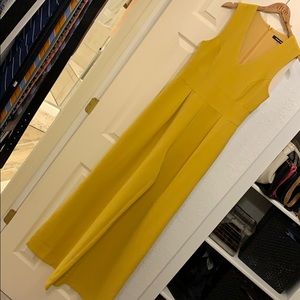 Mustard yellow tank top jumpsuit with flared pants